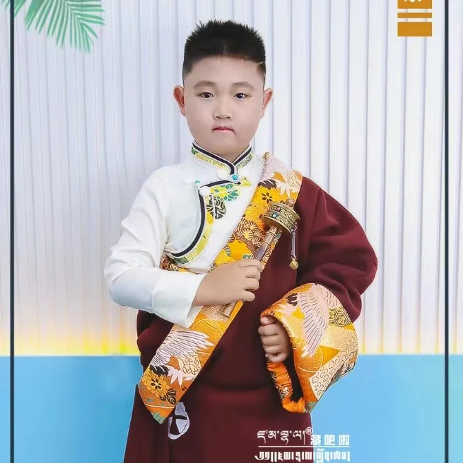 25 سنة الأطفال رداء التبت الجديد التطريز تقليد الملابس التبتية الفتيان والفتيات نفس النمط