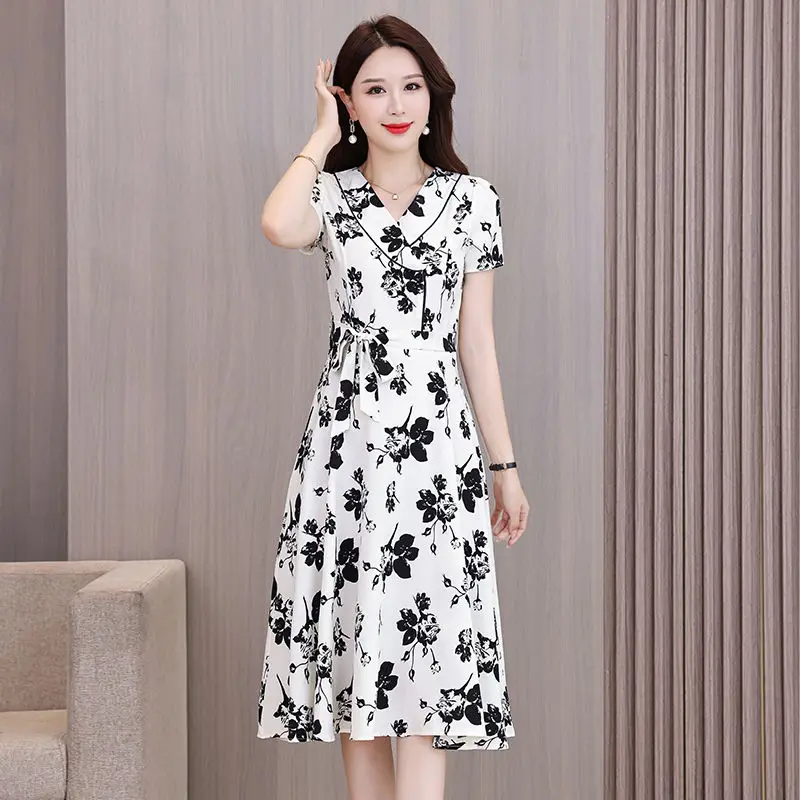 فستان نسائي صيفي ميدي موضة الأزهار طباعة كشكش كاب الأكمام الخامس الرقبة ألف خط Vestidos عادية جاهزة الخصر فستان الشمس الطرف