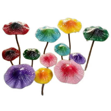 Outdoor garden planting - One large and one small colorful mushroom, made of metal, for outdoor garden decoration.