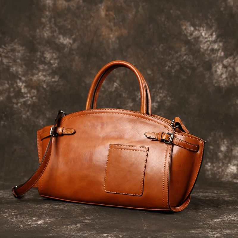 Wings bag, genuine leather women's bag, new style handbag, retro handmade wrapping layer, cowhide big bag, women's dumpling bag