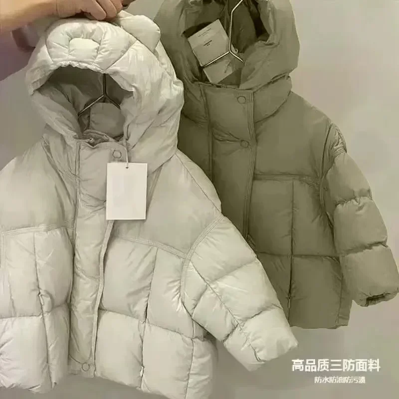 Cappotto per ragazze 2024 piumino invernale piumino per ragazzi nuova giacca imbottita in cotone versione coreana tinta unita con cappuccio spessa