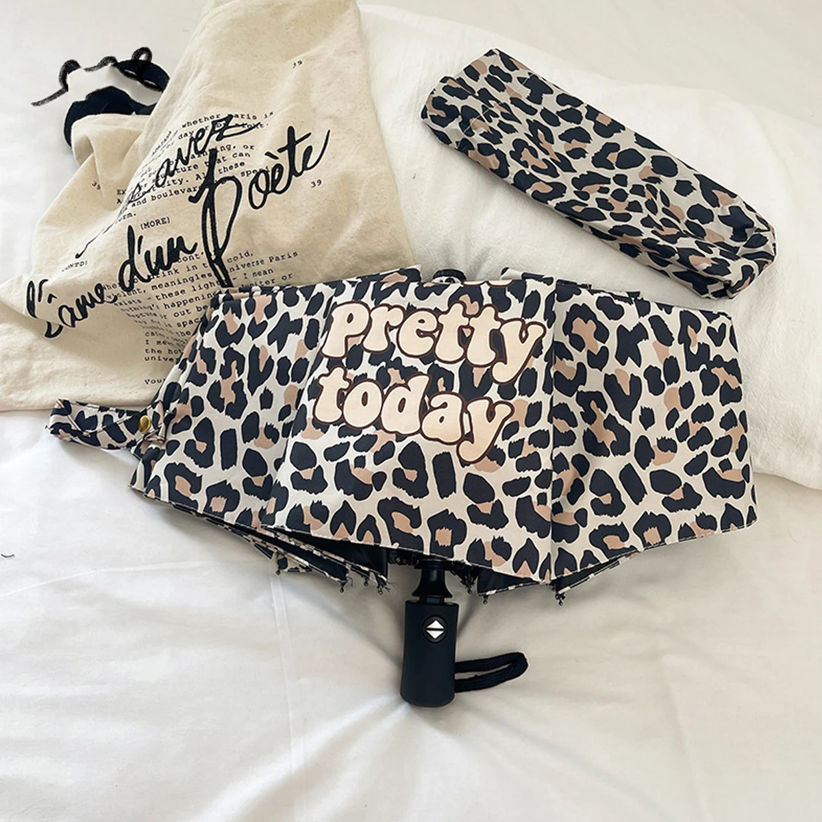 Leopard print retro three fold fully automatic black rubber rain and sun dual-use sun protection and UV protection umbrella