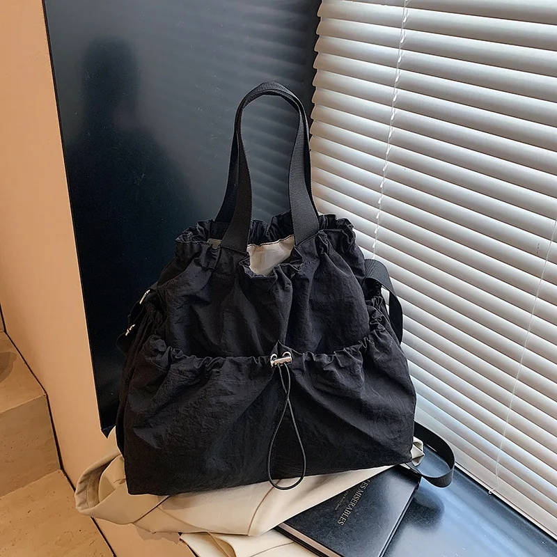 2025 New Nylon Drawstring Backpack for Women, Spacious Travel Rucksack, Water-Resistant Gym Bag, Versatile & Lightweight​