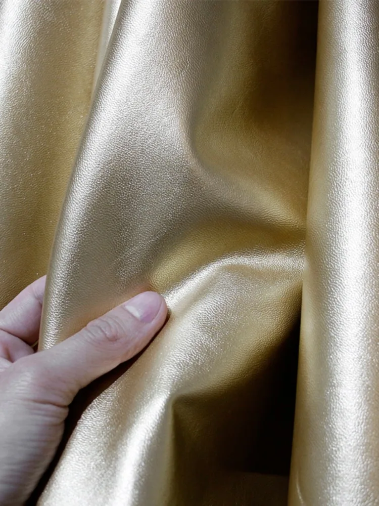 PU Leather Fabric Fine Grain Skin Champagne Gold Soft Leather Elastic Free Clothing Designer Fabric Cloth Apparel Sewing