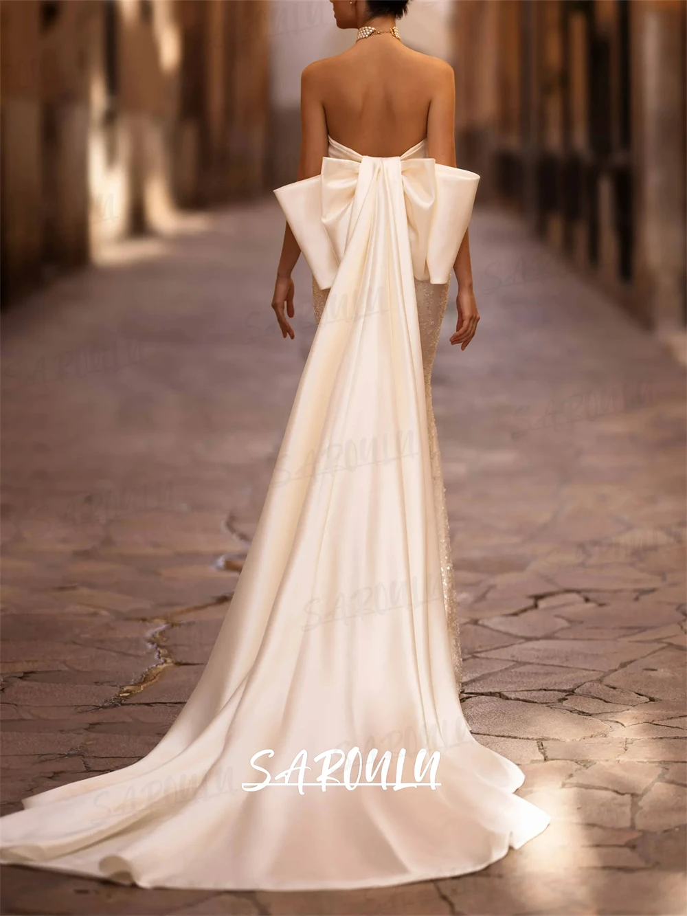 Abito da sposa da donna lucido senza spalline con strascico a fiocco Abiti da sposa lunghi a sirena affascinante Abito da sposa di lusso personalizzato