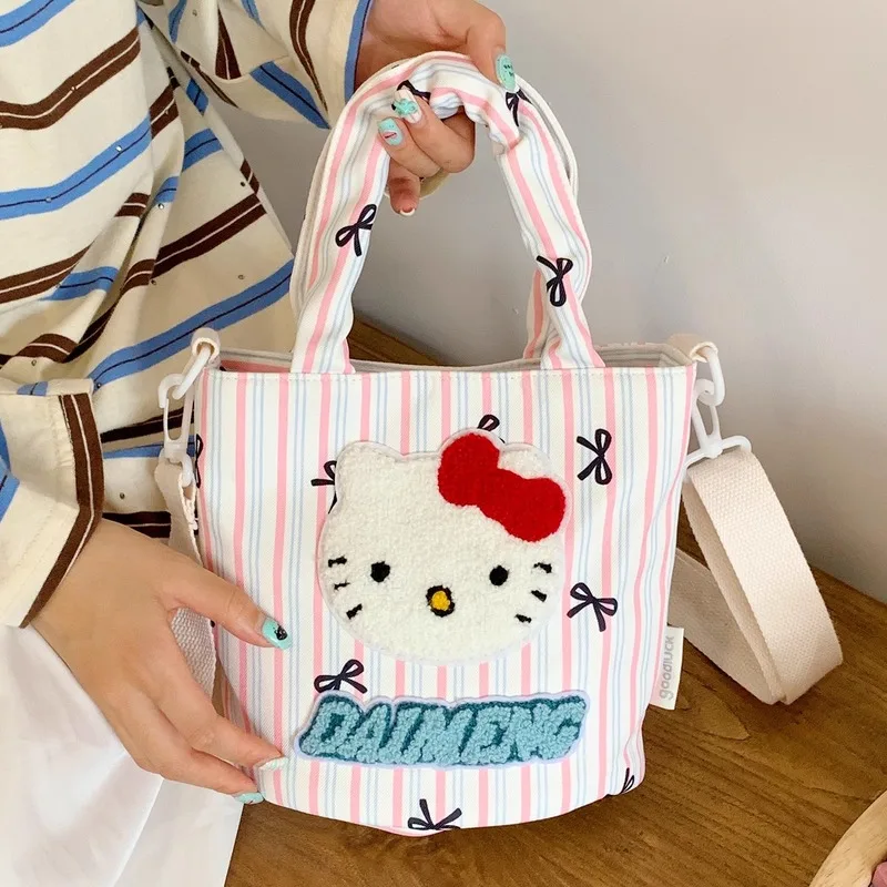 

Genuine HelloKitty bag, cute female cartoon, large capacity portable bucket bag, casual versatile single shoulder crossbody bag