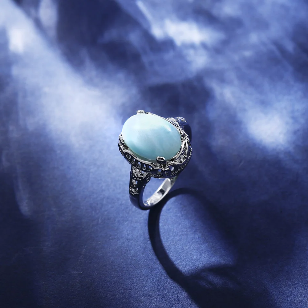 

JieLing Stylish Silver-Tone 18K Gold Over Copper Ring, Oval Larimar Gemstone, Fashionable Statement Piece for Her