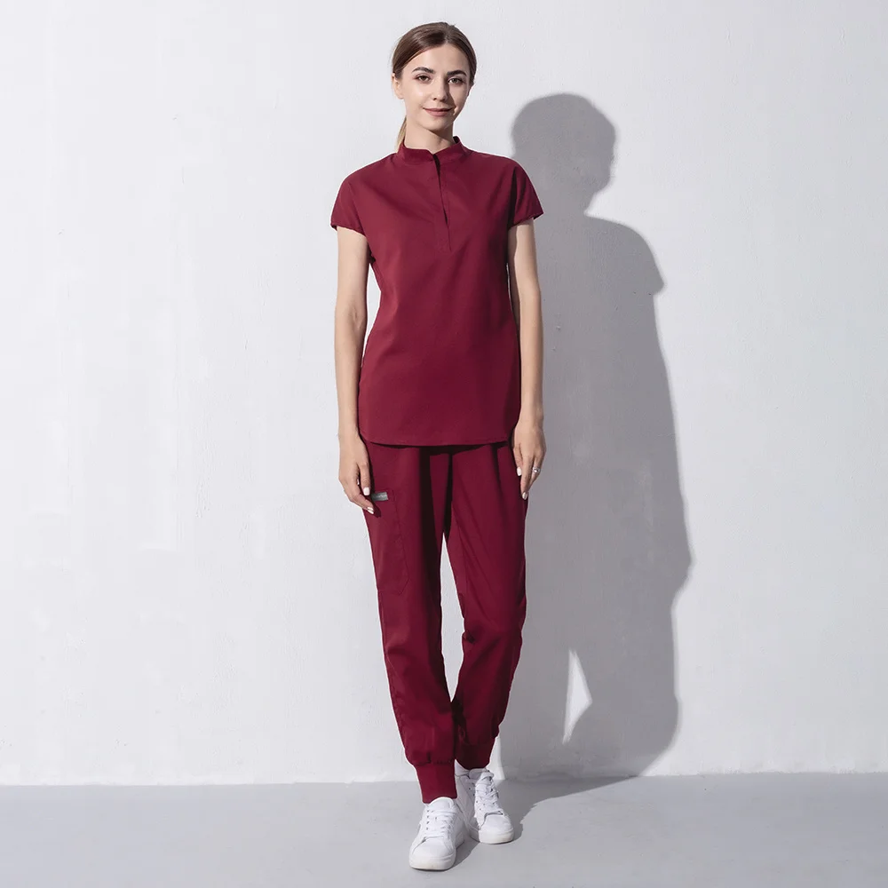 Medische petten Tandheelkundig ziekenhuis Unisex werkuniformen Verpleegstersaccessoires Tops + broeken met korte mouwen Verplegingsscrubs Pakken