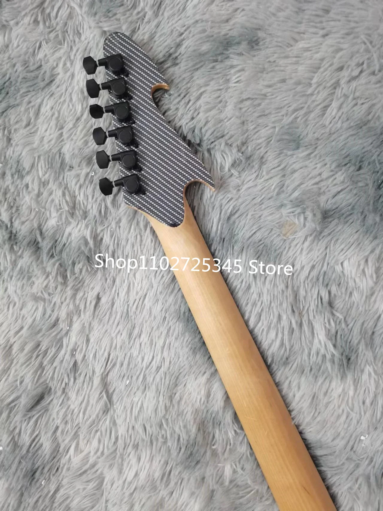 6-string skull electric guitar, maple fingerboard, silver accessories, tremolo system, free shipping