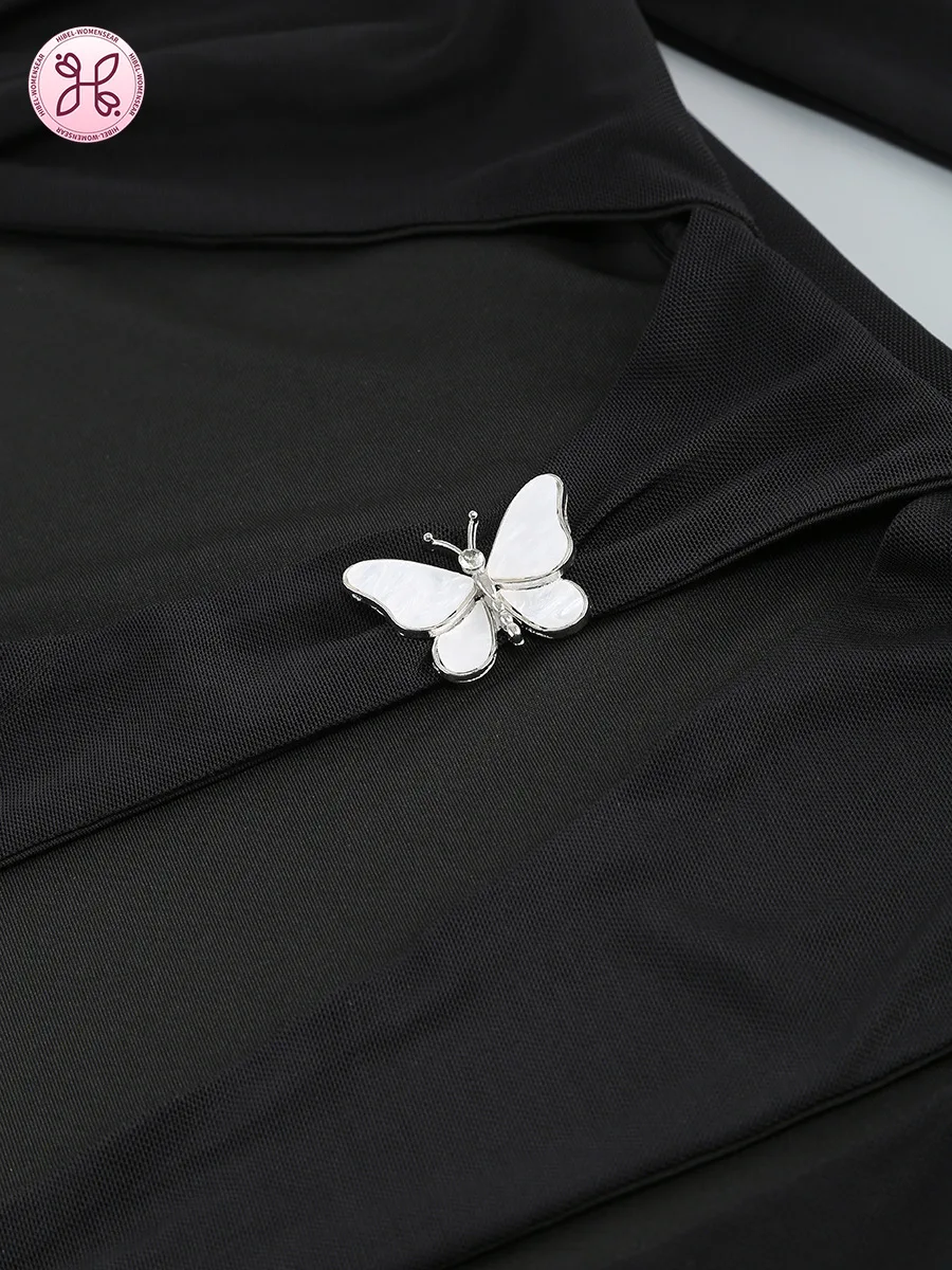 Maxi aderente con ritaglio: fiocco in metallo e spacco alto, abito da notte di gala