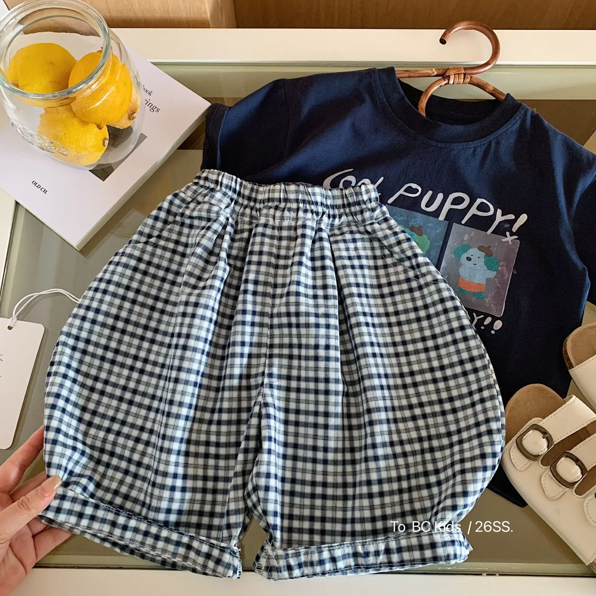 Boys' mid length pants 2026 summer new Korean version children's checkered five quarter boys' loose pants trend