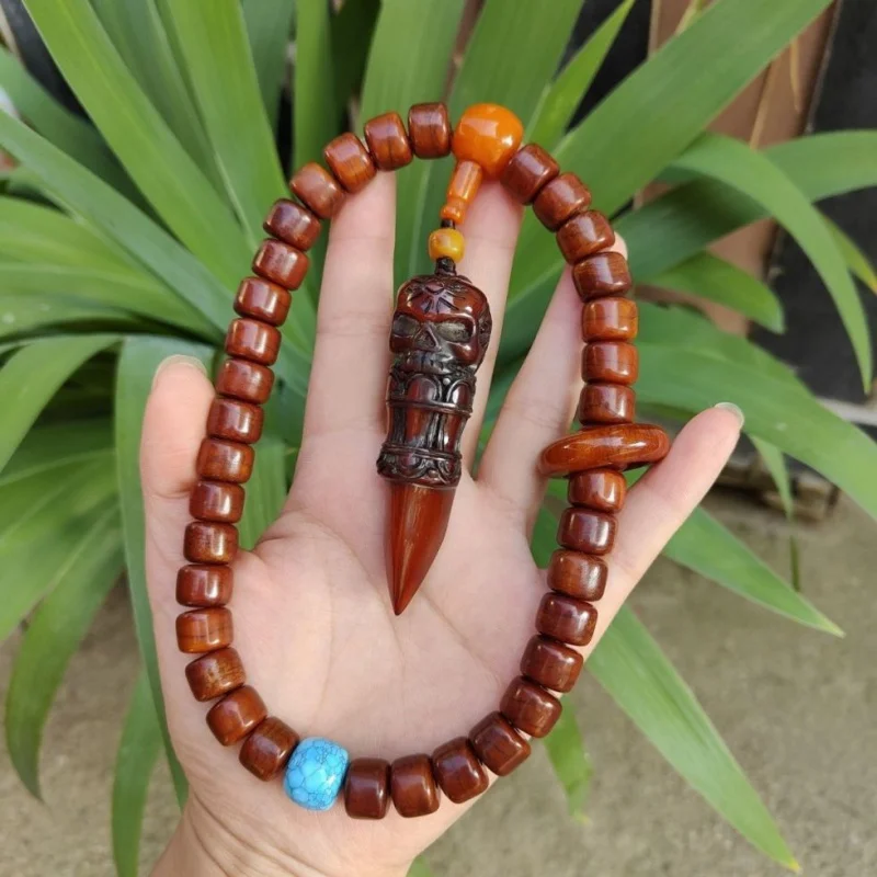 Handheld Bone Bracelet with Yak Horn and Pestle Pendant