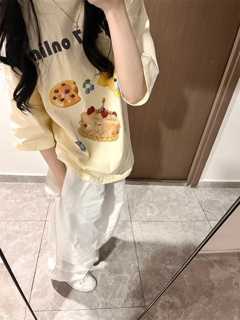 تي شيرت نسائي صيفي بأكمام قصيرة على الطراز الكوري أنيق ومريح وفضفاض مناسب جرافيك جمالي كاجوال ملابس يومية للشارع