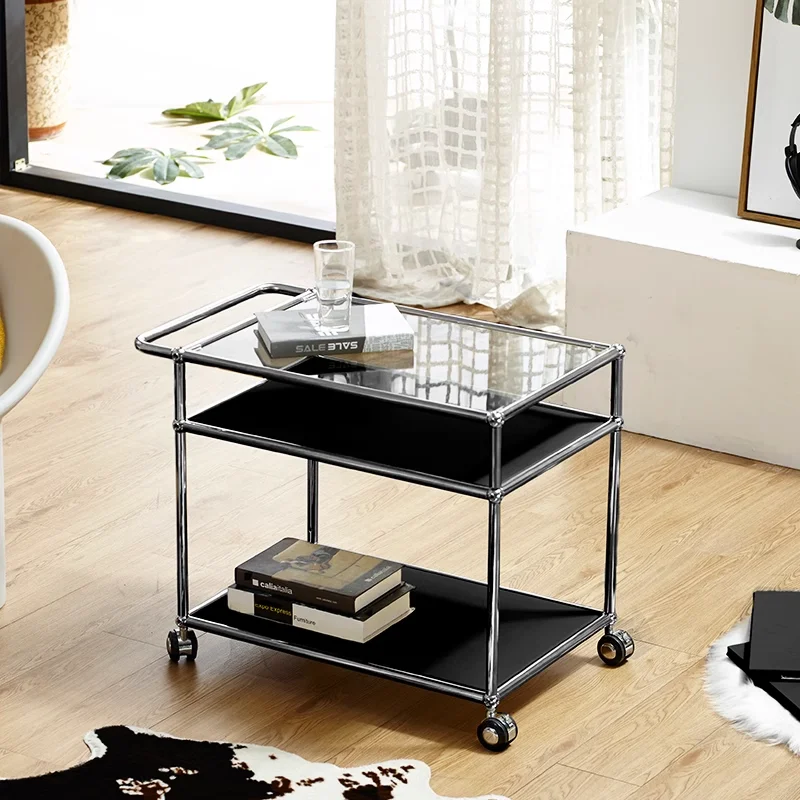 The antique three-story trolley storage shelf is movable, with wheels on the floor, the living room sofa metal side table