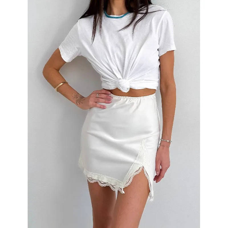 Novedad de verano, falda de cintura alta con costuras de encaje, diseño con abertura, temperamento de moda, intelectual salvaje, europeo y americano