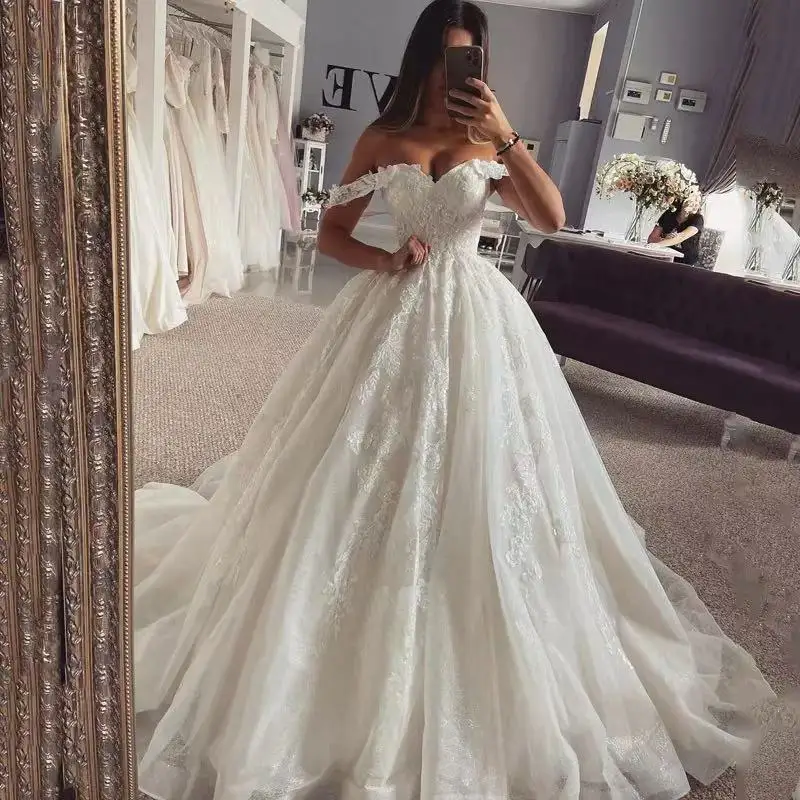

Elegant A-Line Princess Wedding Dresses Off The Shoulder Lace Appliques Bridal Gowns Boho Beach Tulle Wedding Dress Plus Size