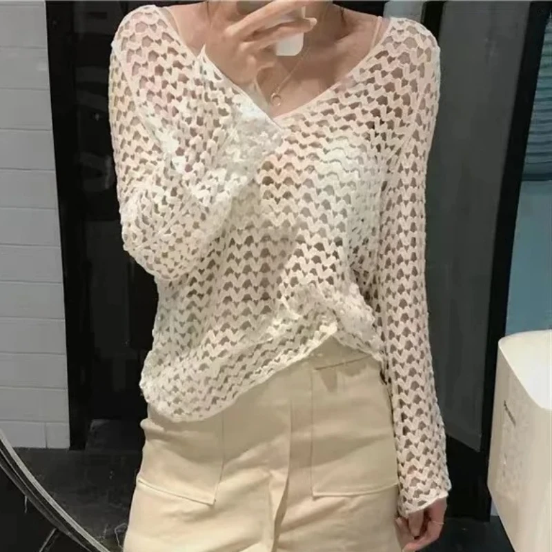 自由奔放に生きる長袖かぎ針編みトップ女性オープンステッチニットブラウスプルオーバー女性春夏ボヘミアン休暇ビーチ衣装