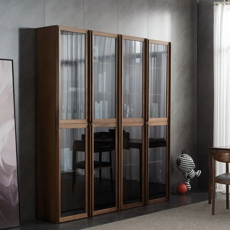 

Комбинация книжных шкафов из черного ореха (Северная Америка), полностью из массива дерева, с стеклянными дверцами и шкафчиками.