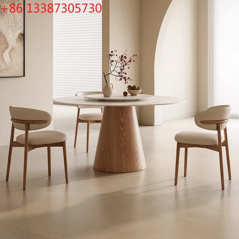 

Круглый обеденный стол из массива дерева с каменной столешницей, кремового цвета, чисто белый, современный, простой, для дома.