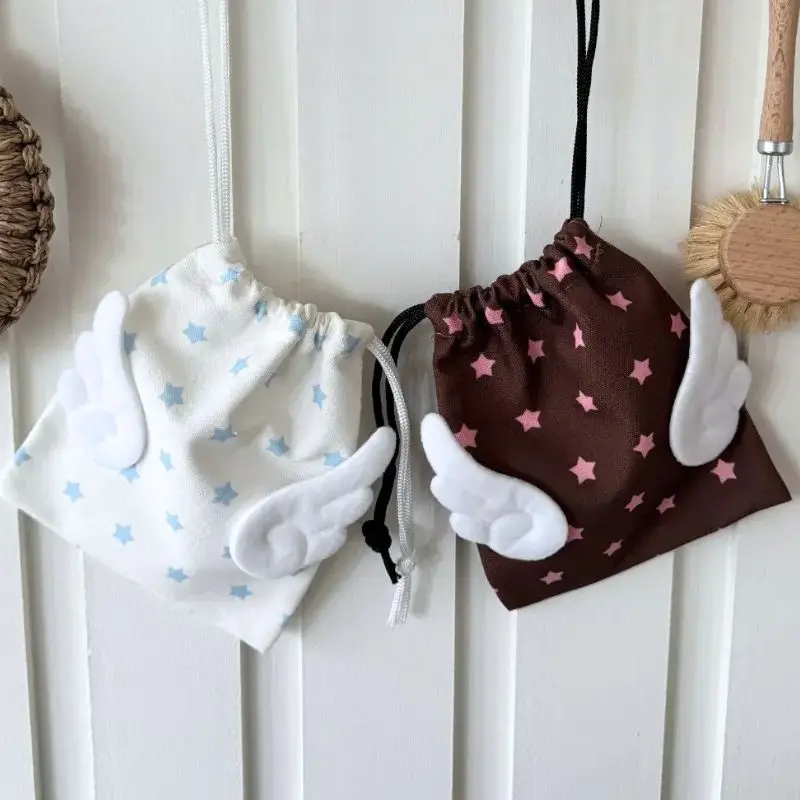 

HOT Canvas Angel Wings Stars Makeup Bag INS Drawstring Storage Bag Portable Bundle Pocket Dustproof Storage Bag Organizer Bag