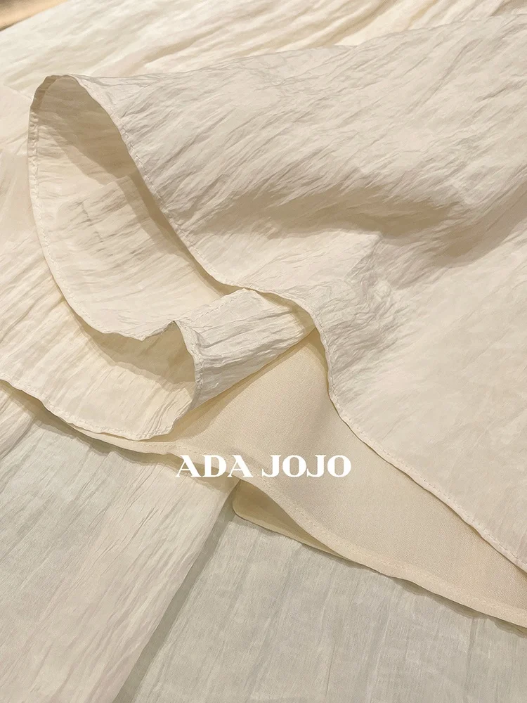 เสื้อกั๊กผู้หญิงสไตล์ยุโรประดับไฮเอนด์ Dr Uneven Hem Svel กระโปรงยาวทรงเอไลน์ฤดูร้อนเดินทางดีไซน์เรียบง่าย