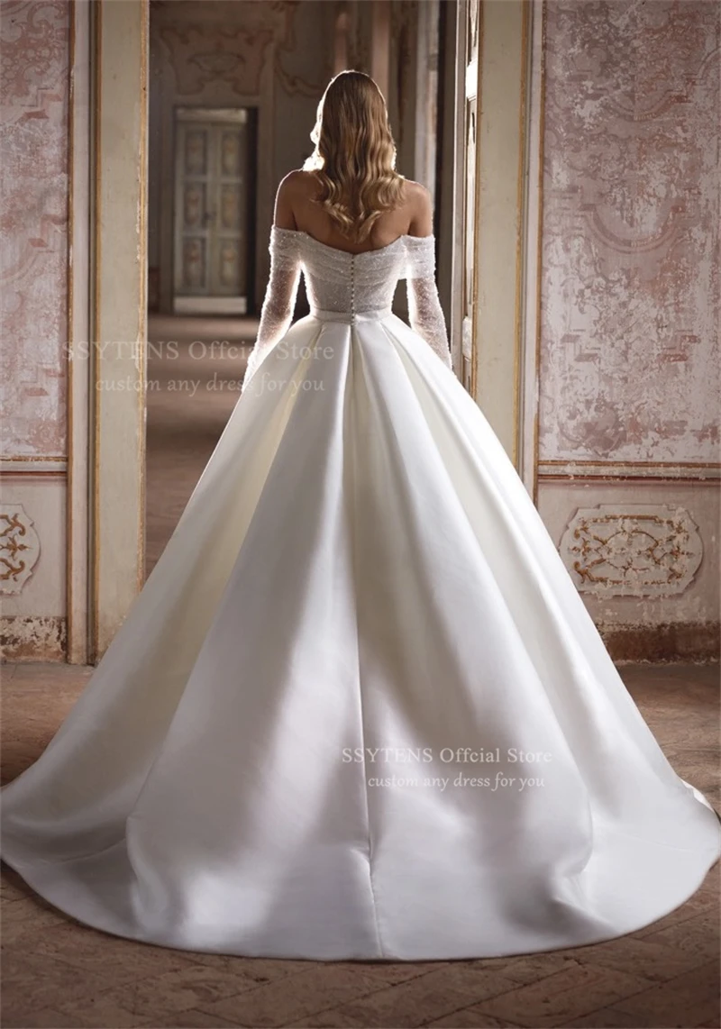 فساتين زفاف SSYTENS الأميرة الساتان للمرأة بأكمام طويلة 2025 فساتين العروس الخرز قبالة الكتف Vestidos De Novia مخصصة