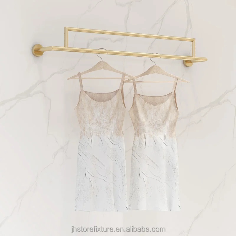 

Custom .Custom.Showroom Design Modern Gold Lady Clothing Display Rack Boutique Clothing Racks Display Wall Display Racks