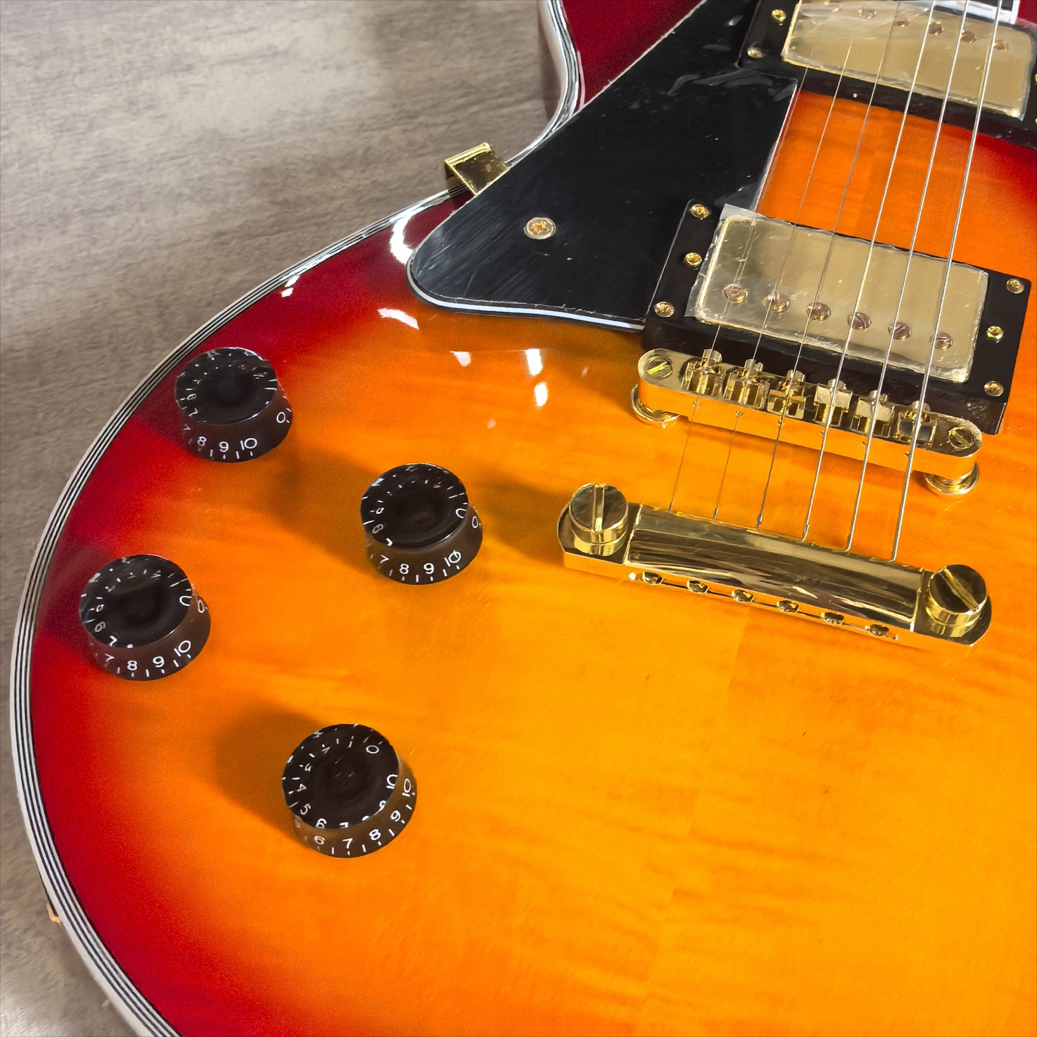 Factory Direct LP007 Sunset Gradient Tiger Pattern Black Shield Electric Guitar HH Microphone Left Hand Free Shipping