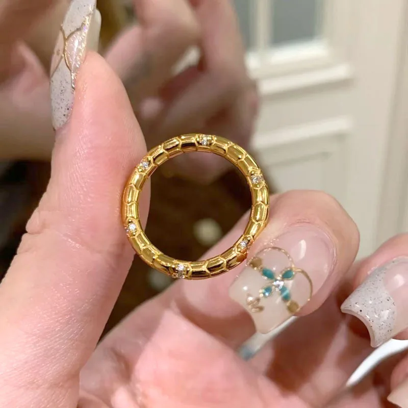 Spirit snake Ouroboos diamond ring women light luxury simple small senior sense food tail ring 9999 gold