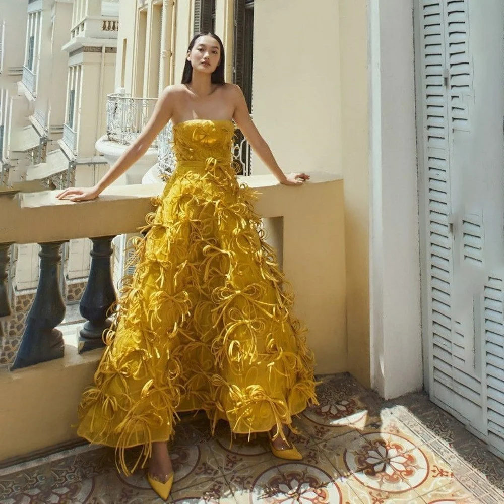 Jasnożółta sukienka na studniówkę bez ramiączek i rękawów z kokardą, luksusowa sukienka wieczorowa o długości do kostek, fason A, suknie wieczorowe.