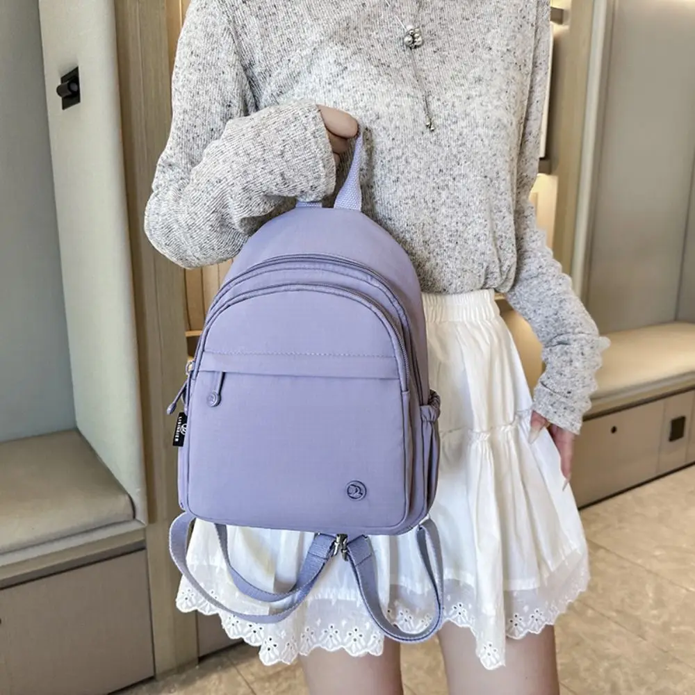 

Портативный женский нейлоновый рюкзак, водонепроницаемый с ручкой, повседневный рюкзак с несколькими карманами, легкий однотонный рюкзак