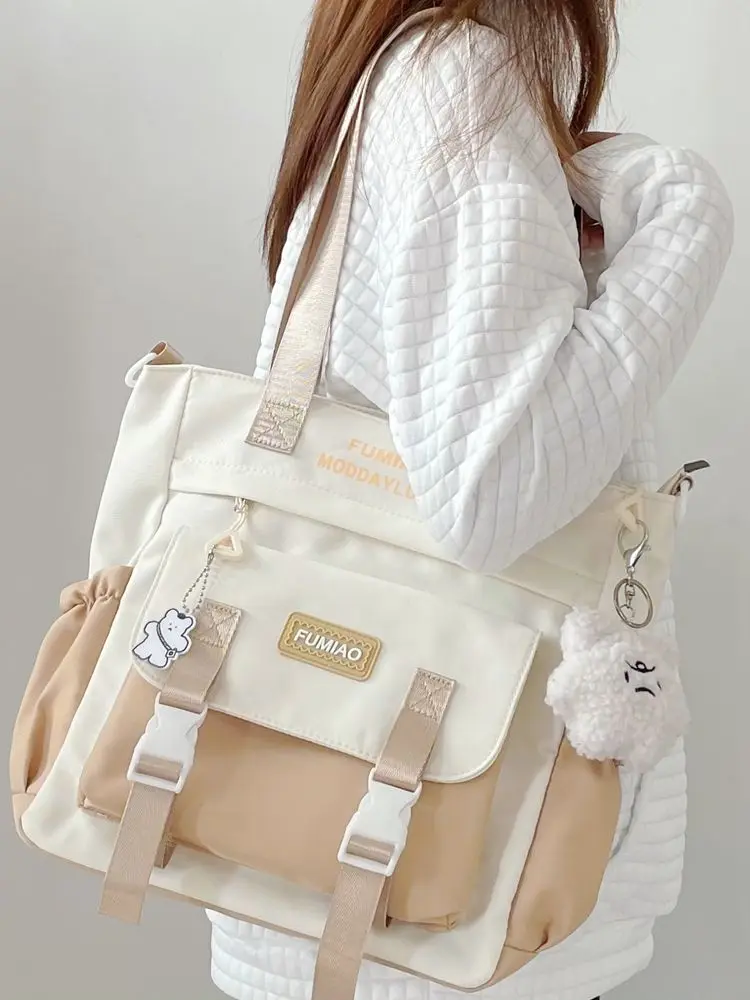 Bolso femenino estudiante universitario bolso de transporte chica gran capacidad un hombro versátil bolso cruzado