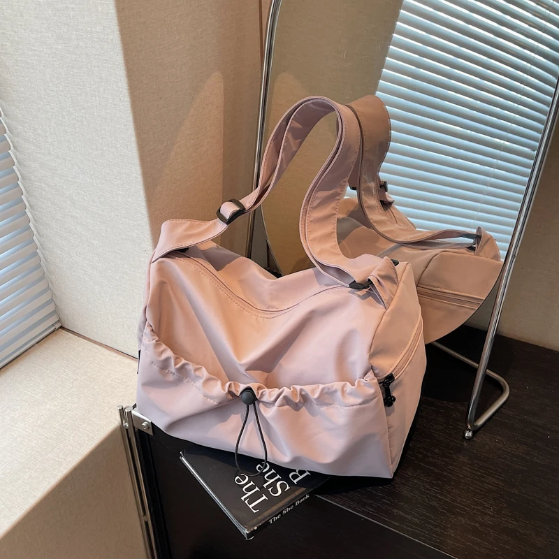 

Nylon Solid Color Large Capacity Shoulder Bags Candy Color Female Bags on Sale 2025 Multiple Pockets Commuting Travel Bag