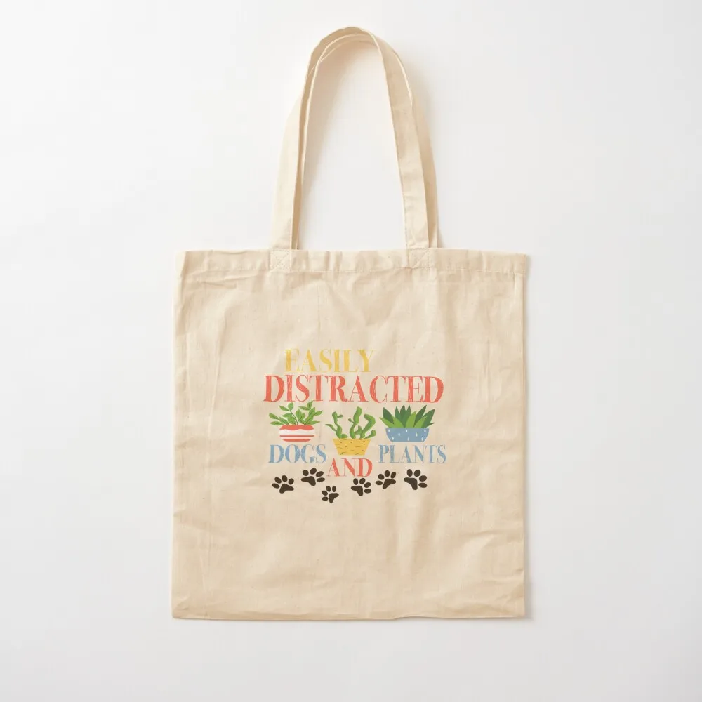 

Easily Distracted By Dogs And Plants ,plants,gardening,distracted,funny,easily distracted,cute,nature,distracted by,fa Tote Bag