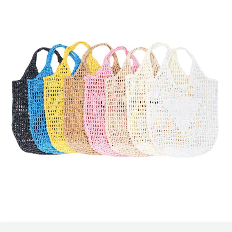 Bolso de mimbre de marca de diseñador de lujo para mujer, bolsos de hombro portátiles grandes a la moda para playa, bolsos de paja de verano 2023