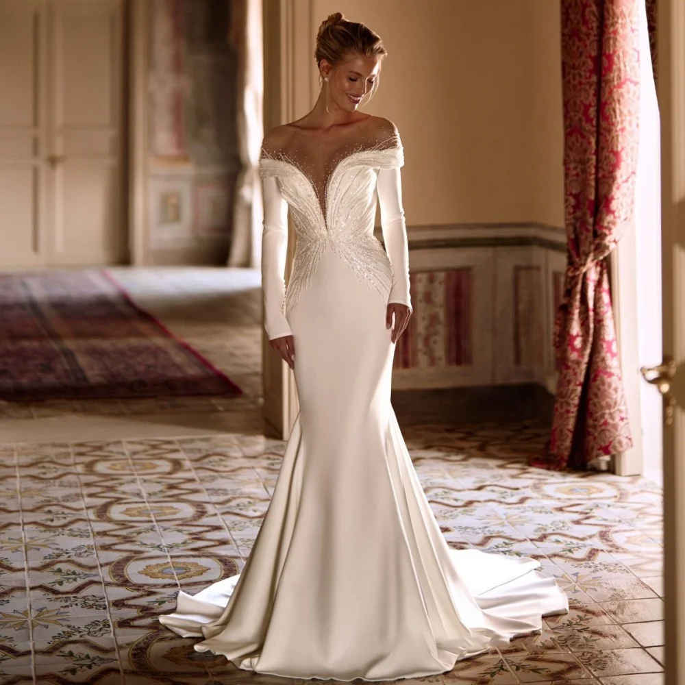 

Customized Exquisite Long Sleeve Wedding Gown Charming O-neck Button Bridal Dresses Beading Bridal Gown Vestidos De Noiva