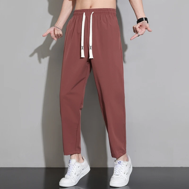 Fashion Solid Color Pockets Lace Up Elastic High Waist Casual Pants Men\'s Clothing 2024 Summer New Loose All-match Cropped Pants