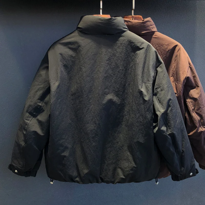 2025 new casual style stand up collar down jacket for men, versatile, warm, simple, pure color, high-end cold resistant coat