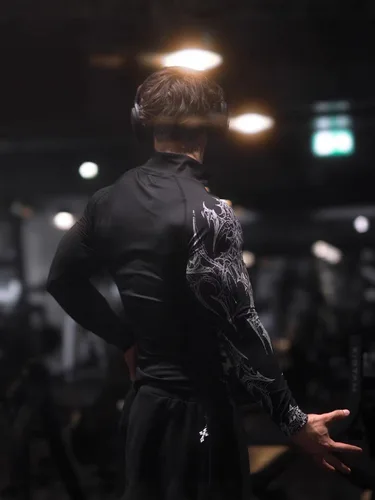 Imagen 2 del producto Chaqueta deportiva de secado rápido con cremallera para hombre, Top de entrenamiento de ajuste de compresión con tela elástica para parejas, entrenamiento y ropa atlética