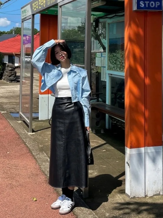 الرجعية عالية الخصر مطاطا بولي Leather الجلود f تنورة للنساء Bla التخسيس منتصف طول شق تنورة Ci تخفيف ألف خط تنورة