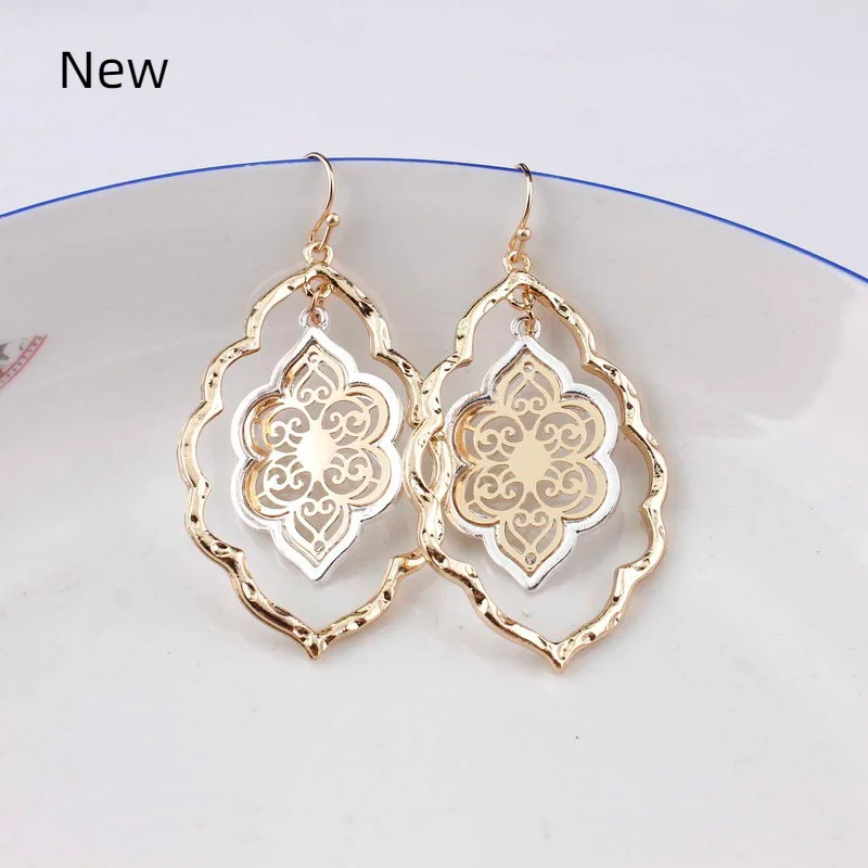 

Gold Filigree Teardrop Dangle Hollow Flower Earrings Wholesale