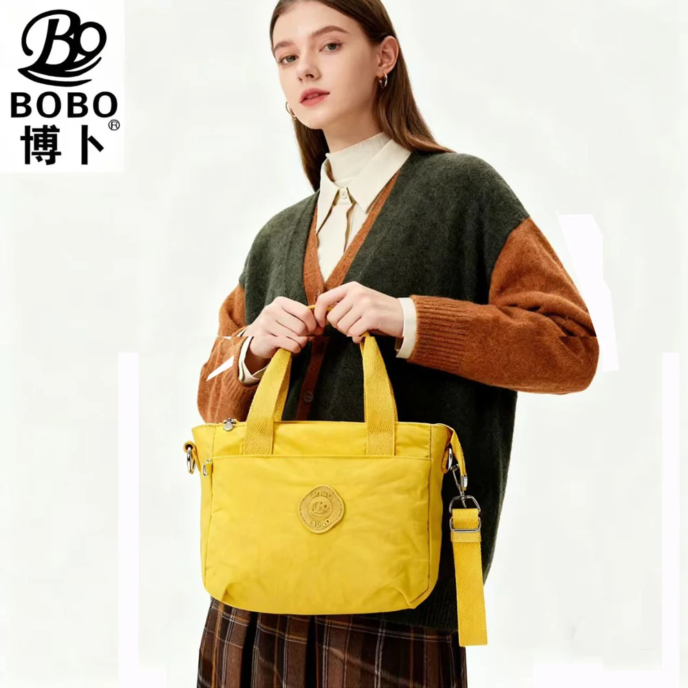 

BoBo Легкая нейлоновая сумка через плечо Водонепроницаемая сумка Сумка-тоут Женская дорожная сумка Повседневная простая съемная сумка...