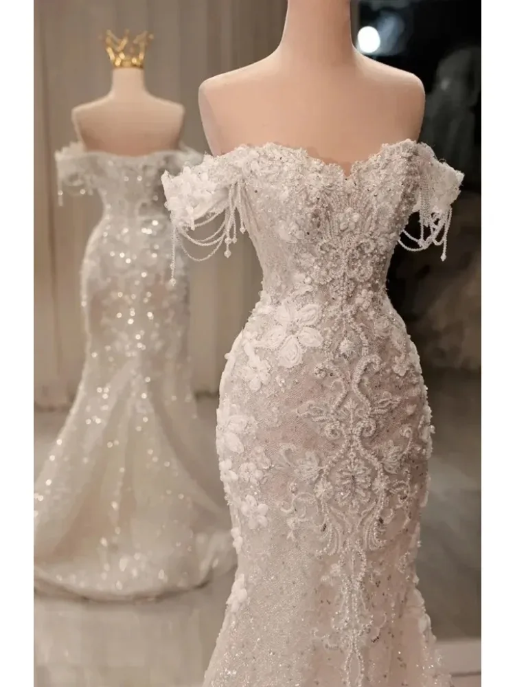 

Customized 2026 New Wedding Dress Luxury Sleeveless Elegant Beaded Mermaid Wedding Dress Plus Size Detachable trailing skirt