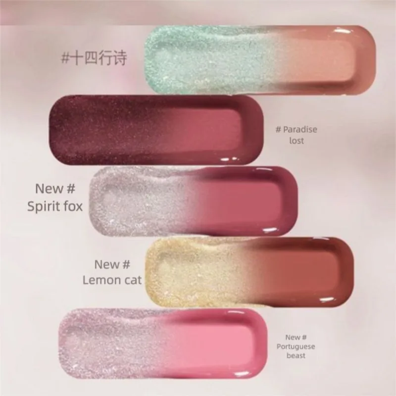 해거드 더블헤드 립글로스 매트 미러 표면은 페어 립스와 레드 립글로스를 보여줍니다