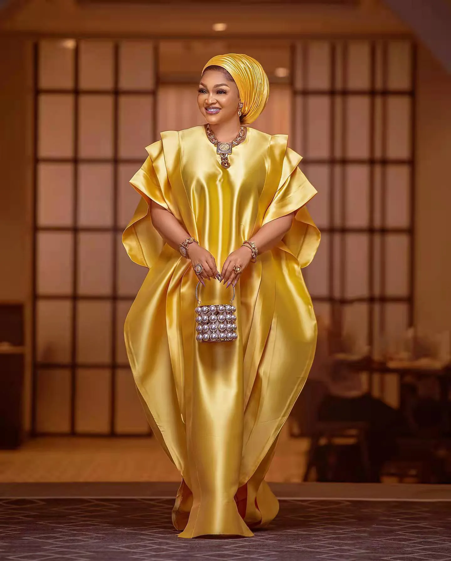 knee length dresses for ladies Àjọkẹ́ Bubu Dress – Ankara Maxi with Embroidery & Tassel Fringe main image 1