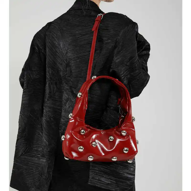 

Korean Handheld Rivet Decoration Design Bag Light Luxury Personalized Crossbody Bag Fashion One Shoulder Underarm Bag For Women