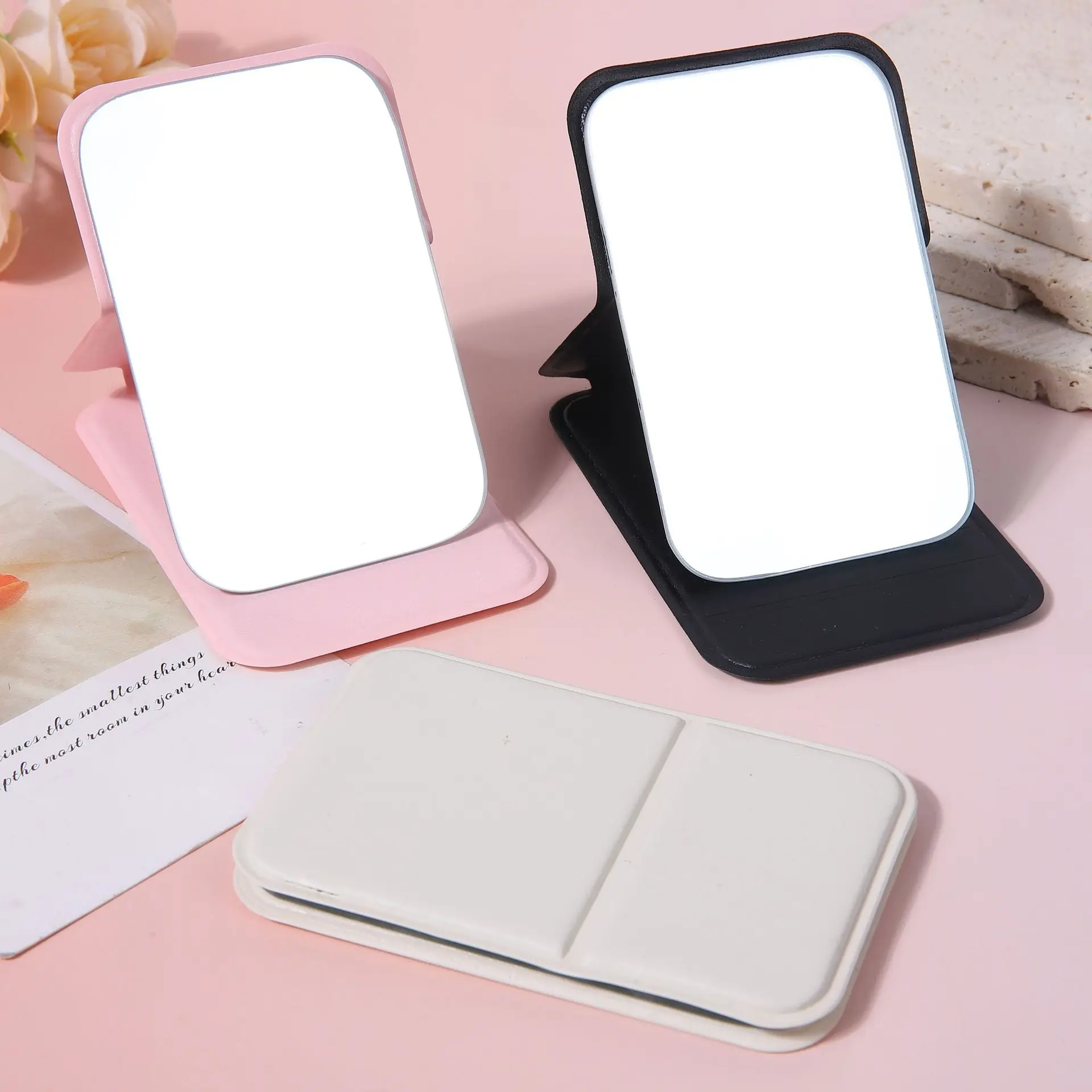 Pu 折りたたみ式ミニ化粧鏡、複数の色が用意されており、軽量でコンパクトで持ち運びが簡単です。