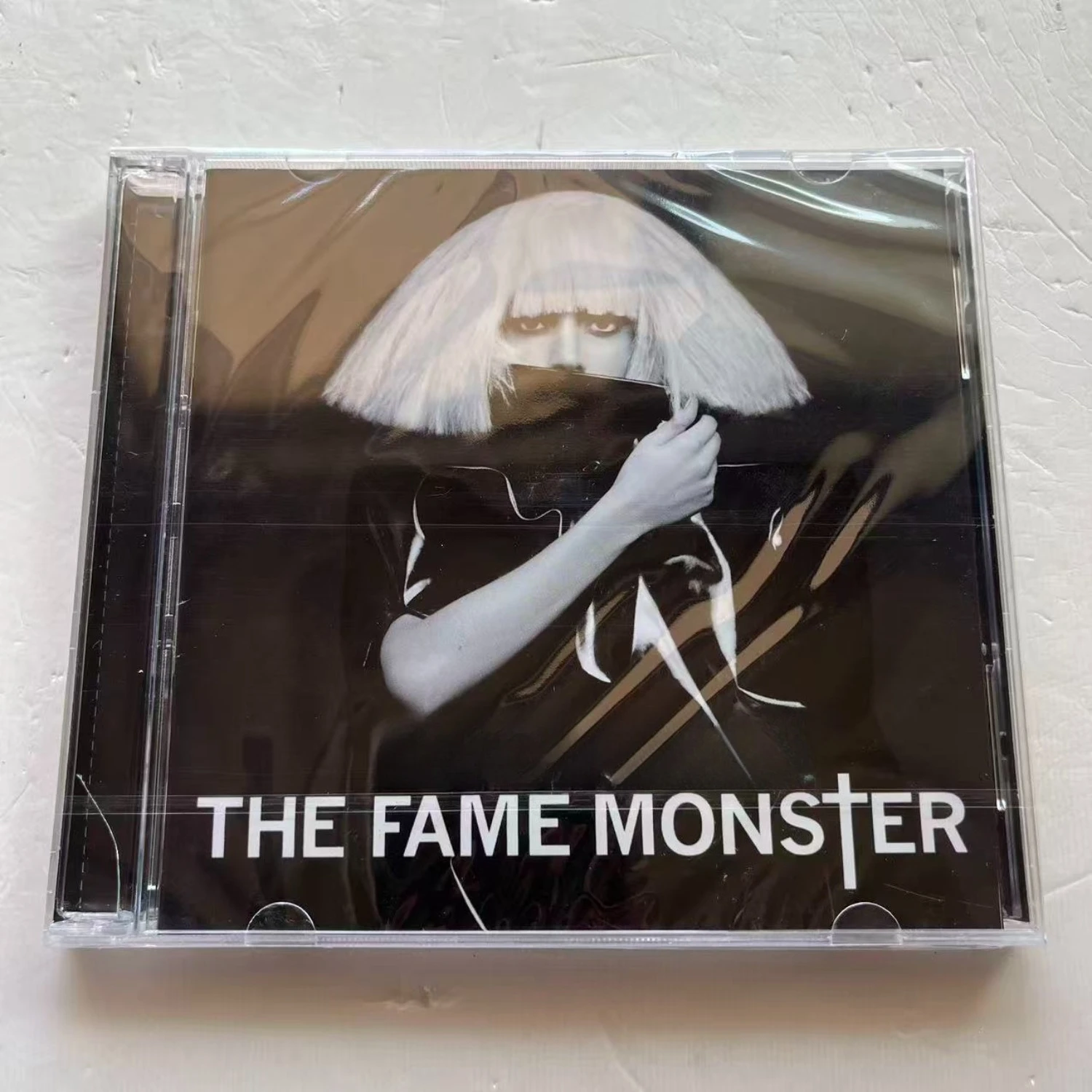 

The Fame Monster CD Album, Pop & Electropop with High-Energy Dance Beats, Dark Pop Aesthetics & Avant-Garde Production