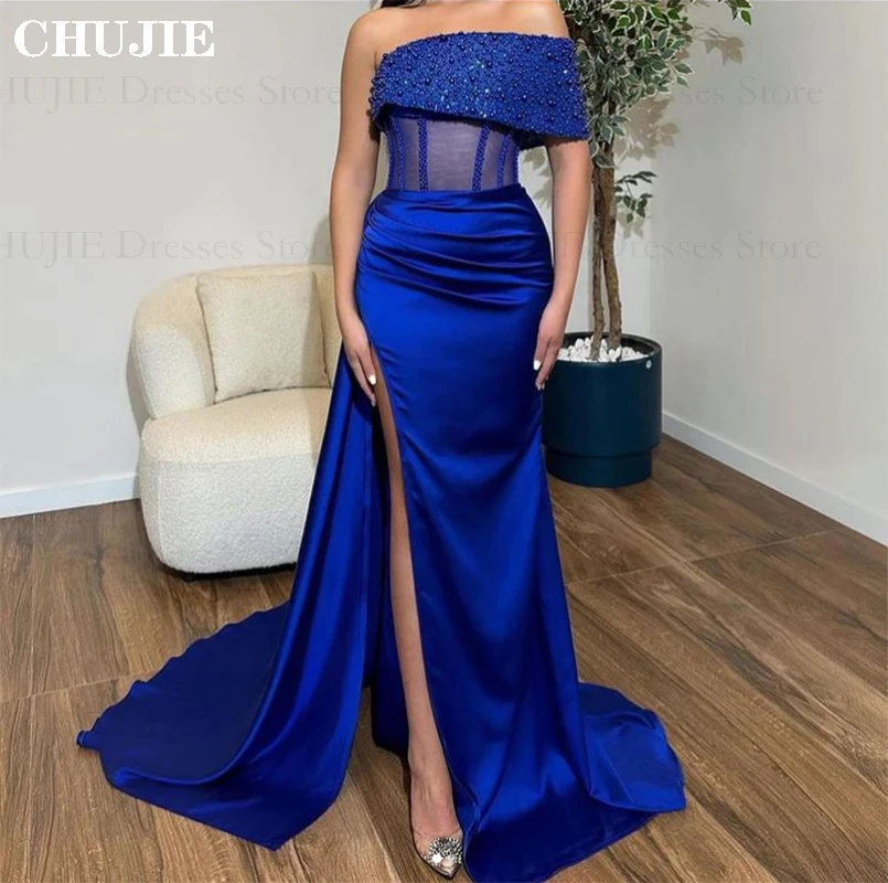 

Dubai Luxury Evening Dress 2025 Royal Blue Sequined Beads Mermaid Prom Dresses Satin Slit Floor Length Vestido Gala حزب اللباس