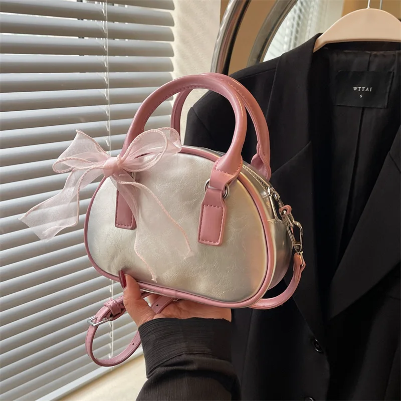 

​​2025 Spring Bow Handle Bag for Women Sweet Edgy Crossbody Purse Unique Color Block Shoulder Bag Trendy Versatile Mini Tote​